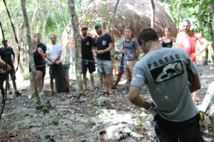 Protec instructor demonstrating to a class