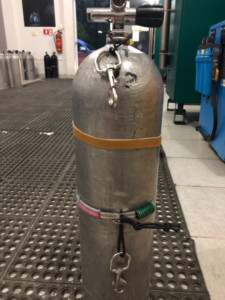 First option demonstrated on a scuba tank