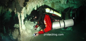 CCR cave diver with bailout tank