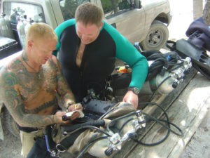 Rich and Johnny reviewing their dive plan